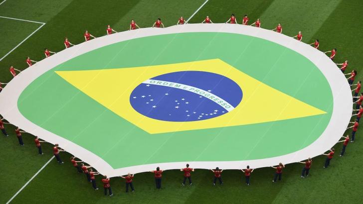 Brazil flag on football pitch